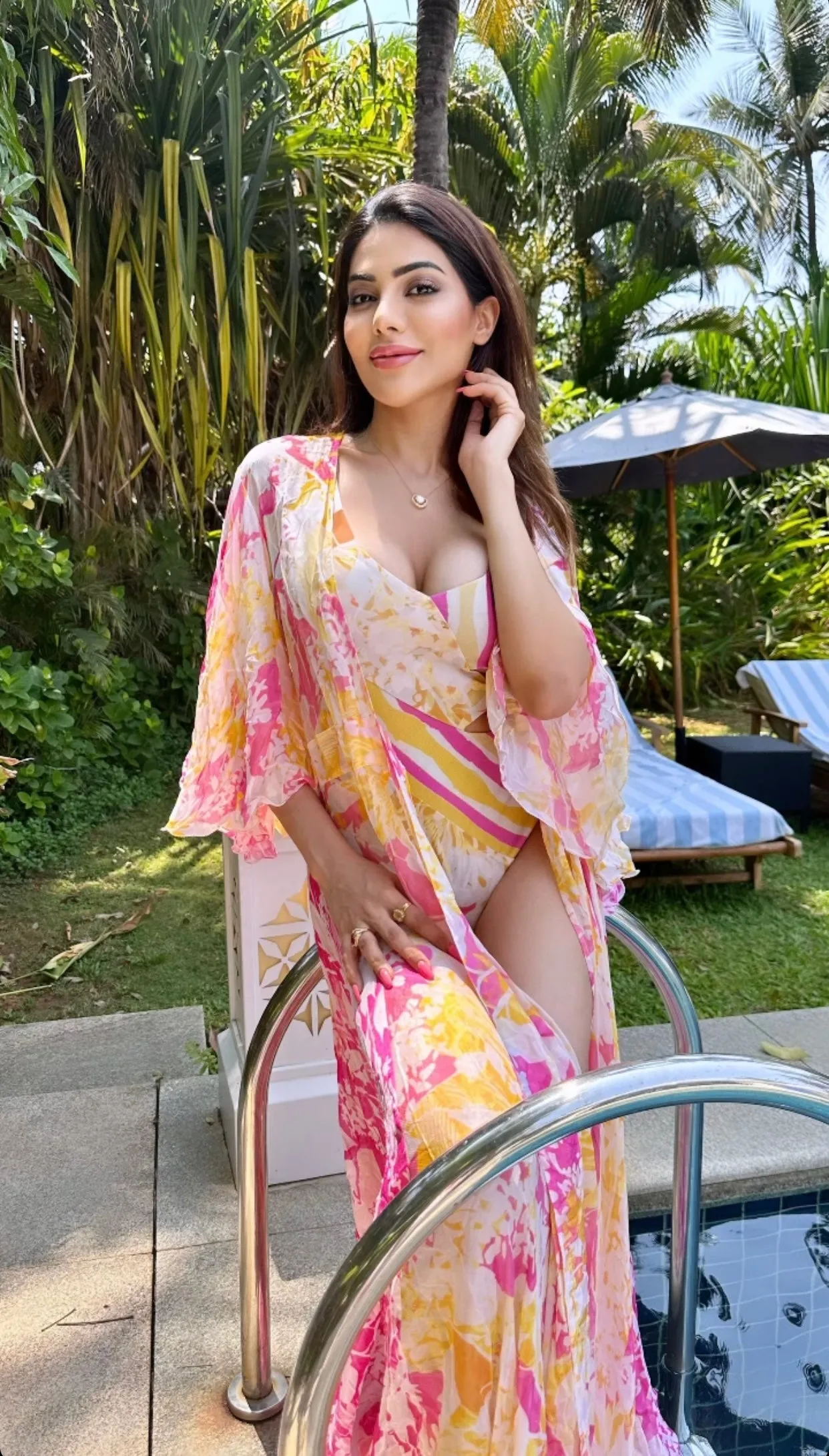 Nikki Tamboli - Orchid & daisy bodysuit with cape