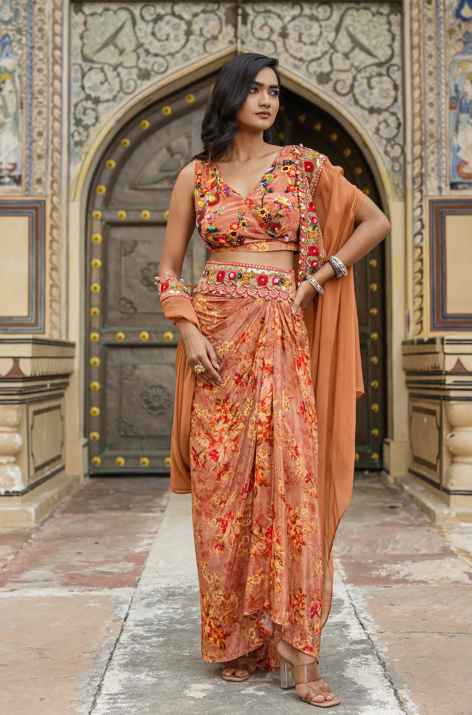 Rust Crepe Silk Printed Drape Skirt Set With Cape