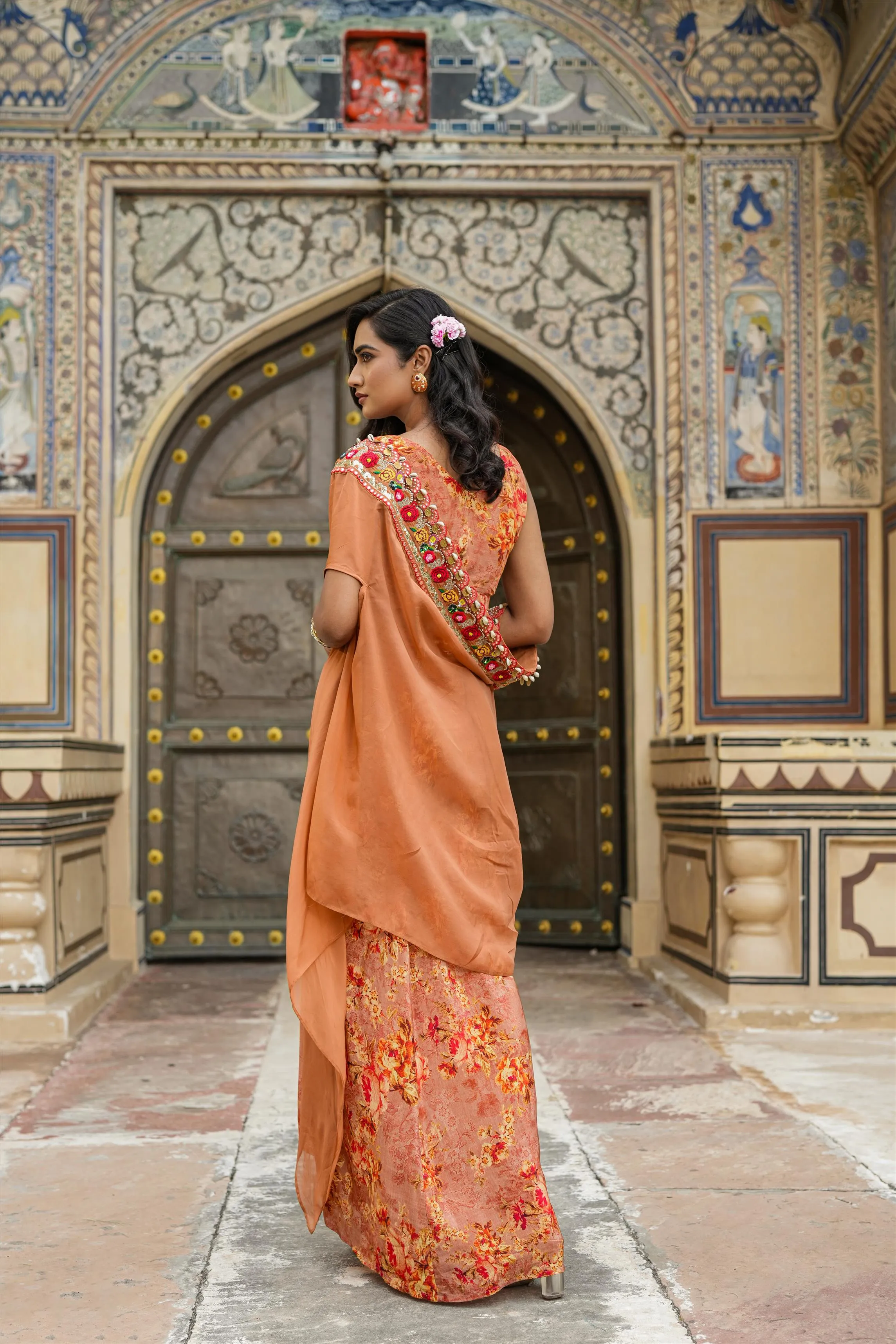 Rust Crepe Silk Printed Drape Skirt Set With Cape